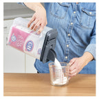 Playful Geometric 3.5 QT Plastic Food Dispenser, Clear with Gray Lid (1 Each) 7.5" L x 3.75" W x 9.25" H, Designed to Help wi... - Squishy Dohnut Sweet Treat Shaped Stress Toy Detail